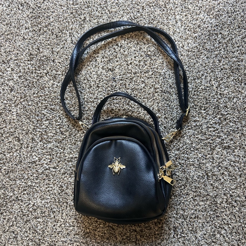 Stylish Black Backpack with Gold Bee Detail